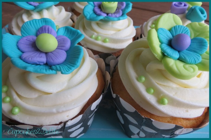 Turquoise, Lime Green & Purple Flower Cupcakes